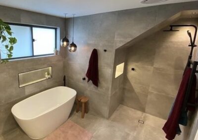 a bathroom with led lighting niche