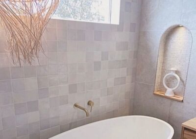 custom built arched shower niche