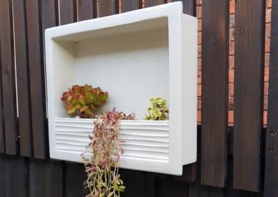 mounted square niche with succulents